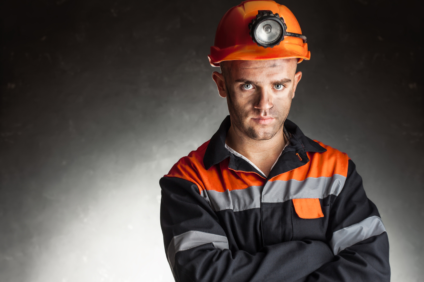 Portrait of serious coal miner